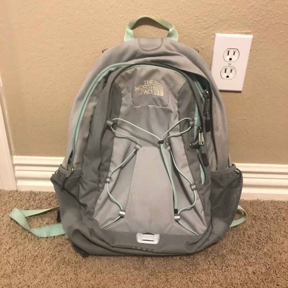 Used Northface mint and grey backpack